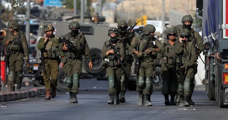 Israel vows major West Bank operation, cordons off city of Hebron