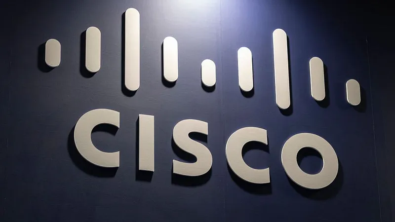 Cisco gives 27-year-old engineer unlimited AI tokens to rewrite 98% of the company's legacy code in 24 months — president plucks former startup founder, telling him to 'go nuts'