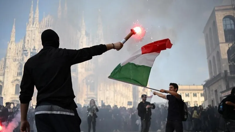 Italy sends troops, toughens security laws after Milan clashes