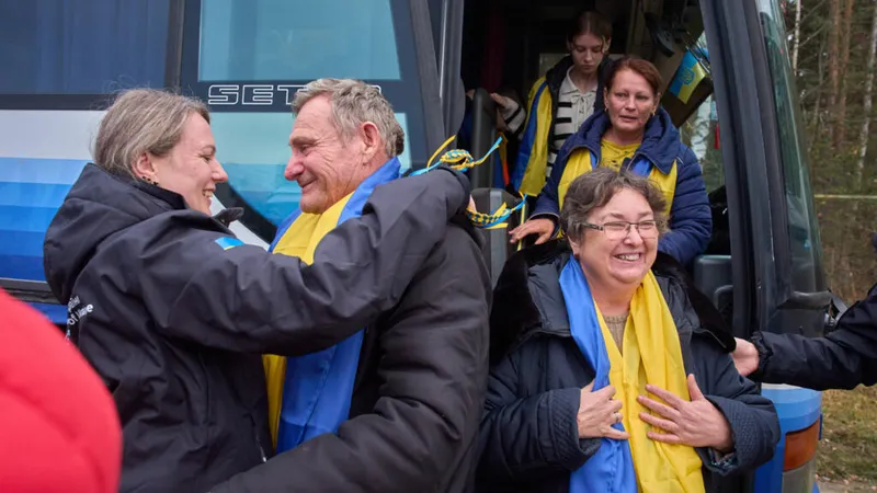 Residents from Russian-occupied Oleshky reunite with families after evacuation operation