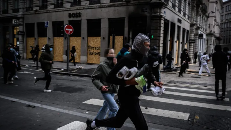 Looters seize on massive French protests to raid and vandalise shops