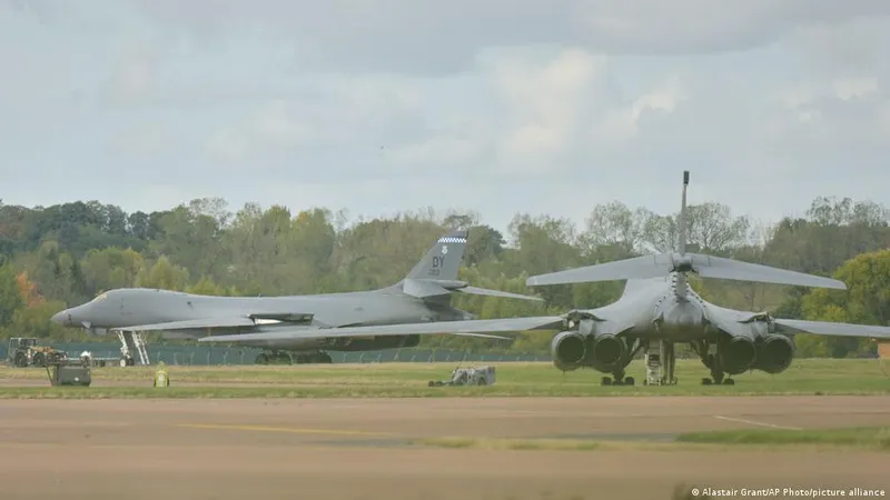 Two men face UK national security charges following an incident near RAF Fairford, with police suspecting Iranian state involvement